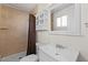 Bathroom featuring tiled shower, vanity with sink, and neutral colors at 3724 E Joan De Arc Ave, Phoenix, AZ 85032