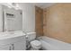 Bathroom with tiled shower, vanity with sink, and a toilet at 3724 E Joan De Arc Ave, Phoenix, AZ 85032