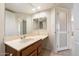 Bathroom featuring a vanity with drawers and sink with a bright mirror at 4200 N Miller Rd # 220, Scottsdale, AZ 85251