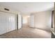 Bedroom featuring hardwood floors, a large closet, and natural light at 4200 N Miller Rd # 220, Scottsdale, AZ 85251