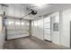 Attached garage with interior access, storage shelves, and automatic door opener for added convenience at 4455 E Paradise Village S Pkwy # 1068, Phoenix, AZ 85032