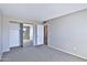 Bedroom featuring a large mirrored closet and neutral carpeting and paint at 4536 W Bloomfield Rd, Glendale, AZ 85304