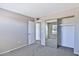 Spacious bedroom features neutral walls, carpet, and a mirrored closet at 4536 W Bloomfield Rd, Glendale, AZ 85304