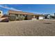 Charming single-story home with brick accents, lush landscaping, and a two-car garage at 4536 W Bloomfield Rd, Glendale, AZ 85304