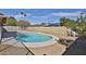 A spacious backyard boasts a sparkling pool, perfect for entertaining or relaxing under the sun at 4536 W Bloomfield Rd, Glendale, AZ 85304