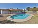 Backyard pool with a metal fence along the perimeter of the home at 4536 W Bloomfield Rd, Glendale, AZ 85304