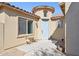 Charming front entrance featuring a light blue door, tile roof and seating area at 4960 S Huachuca Pl, Chandler, AZ 85249