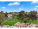 Scenic aerial view of community green space and park-like areas with established landscaping at 542 S Higley Rd # 83, Mesa, AZ 85206