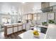 Bright kitchen with stainless steel appliances, white cabinets, and modern countertops at 542 S Higley Rd # 83, Mesa, AZ 85206