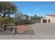 Charming single-story home featuring low maintenance desert landscaping and a spacious driveway at 5518 E Cambridge Ave, Phoenix, AZ 85008