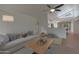 Bright and airy living room with vaulted ceilings and an arched window at 5518 E Cambridge Ave, Phoenix, AZ 85008