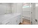 Clean bathroom featuring a white vanity and tub with subway tile at 625 N Vine St, Chandler, AZ 85225