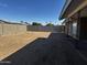 Expansive backyard showcasing a durable block fence and an open layout at 6308 E Billings St, Mesa, AZ 85205