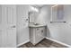 Bright bathroom with granite vanity, updated cabinets and flooring, and modern fixtures at 6308 E Billings St, Mesa, AZ 85205