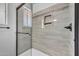 Modern shower stall with new tile, fixtures and shower head at 6308 E Billings St, Mesa, AZ 85205