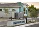 The Ocotillo Lane street sign with the view of the home's exterior in the background and new landscaping at 6710 N 9Th Dr, Phoenix, AZ 85013