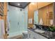 Modern bathroom with sleek glass shower, marble countertop, and contemporary fixtures at 7686 E Stagecoach Pass Rd, Carefree, AZ 85377