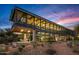 Modern home with walls of glass, offering great light and views, set in a desert landscape at 7686 E Stagecoach Pass Rd, Carefree, AZ 85377