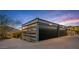 Modern detached garage with steel construction and desert views at 7686 E Stagecoach Pass Rd, Carefree, AZ 85377