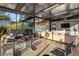 Spacious living area with a home office setup, a cozy seating area, and abundant natural light at 7686 E Stagecoach Pass Rd, Carefree, AZ 85377