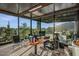 Bright office space with floor-to-ceiling windows offering desert views and modern desk setup at 7686 E Stagecoach Pass Rd, Carefree, AZ 85377