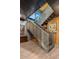 Contemporary staircase with metal railings and wood accents, leading to the upper level of the home at 7686 E Stagecoach Pass Rd, Carefree, AZ 85377
