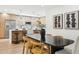 Dining area adjacent to the kitchen with stainless steel appliances and island seating at 8088 E Via Del Valle --, Scottsdale, AZ 85258