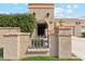 Cozy home entrance with a private gated courtyard and stucco design at 8088 E Via Del Valle --, Scottsdale, AZ 85258