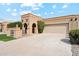 Inviting one-story stucco home with a two-car garage and charming brick accents at 8088 E Via Del Valle --, Scottsdale, AZ 85258