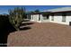 Simple backyard with low-maintenance landscaping at 8235 E Medina Ave, Mesa, AZ 85209