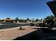 Street view showcasing the neighborhood and surrounding homes at 8235 E Medina Ave, Mesa, AZ 85209