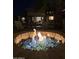 Enjoy cool nights around this cozy outdoor fire pit with views of the water at 844 W Beechnut Dr, Chandler, AZ 85248