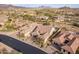 Desirable property featuring desert landscape, brick driveway and tile roof at 8525 E Lynwood St, Mesa, AZ 85207