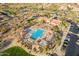 Aerial view of community swimming pool, shaded ramadas and a conveniently located parking area at 8525 E Lynwood St, Mesa, AZ 85207