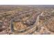 Panoramic aerial view of community featuring winding roads and desert landscaping at 8525 E Lynwood St, Mesa, AZ 85207