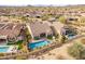 Aerial view of the backyard of the home featuring a swimming pool, spa, and desert landscaping at 8525 E Lynwood St, Mesa, AZ 85207