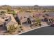 Stunning aerial view of property showcasing tile roof, desert landscaping and a beautiful neighborhood at 8525 E Lynwood St, Mesa, AZ 85207