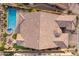 Stunning aerial view of home featuring private pool, hot tub, putting green, and tiled roof at 8525 E Lynwood St, Mesa, AZ 85207