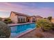 Gorgeous backyard featuring a swimming pool and covered outdoor living space at 8525 E Lynwood St, Mesa, AZ 85207