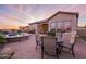 Outdoor living area with a pool, spa, fireplace, outdoor kitchen and lounge at 8525 E Lynwood St, Mesa, AZ 85207