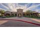 Beautiful clubhouse featuring lush landscaping, desert plants and neutral earth tones at 8525 E Lynwood St, Mesa, AZ 85207