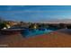 Sparkling pool and spa surrounded by hardscape and desert landscaping at 8525 E Lynwood St, Mesa, AZ 85207