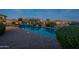 Luxurious pool with desert landscaping and outdoor cooking area at 8525 E Lynwood St, Mesa, AZ 85207