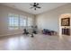 Spacious workout room with large windows and a ceiling fan at 8525 E Lynwood St, Mesa, AZ 85207