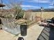 Large backyard featuring garden beds with a concrete patio for outdoor enjoyment at 8732 E Arlington Rd, Scottsdale, AZ 85250