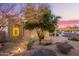 Charming front yard with desert landscaping, native plants and a walkway leading to the entrance at 9812 E Karen Dr, Scottsdale, AZ 85260