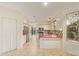 Well-lit kitchen featuring stainless steel appliances and ample cabinet space at 9812 E Karen Dr, Scottsdale, AZ 85260