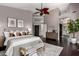 Elegant bedroom with a ceiling fan, a bench, and nice decor at 9812 E Karen Dr, Scottsdale, AZ 85260