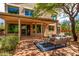 Comfortable outdoor patio with cozy furniture and an awning at 9812 E Karen Dr, Scottsdale, AZ 85260