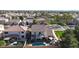 Expansive backyard with a refreshing pool, covered patio, and lush landscaping perfect for outdoor entertaining and relaxation at 10322 W Edgemont Dr, Avondale, AZ 85392
